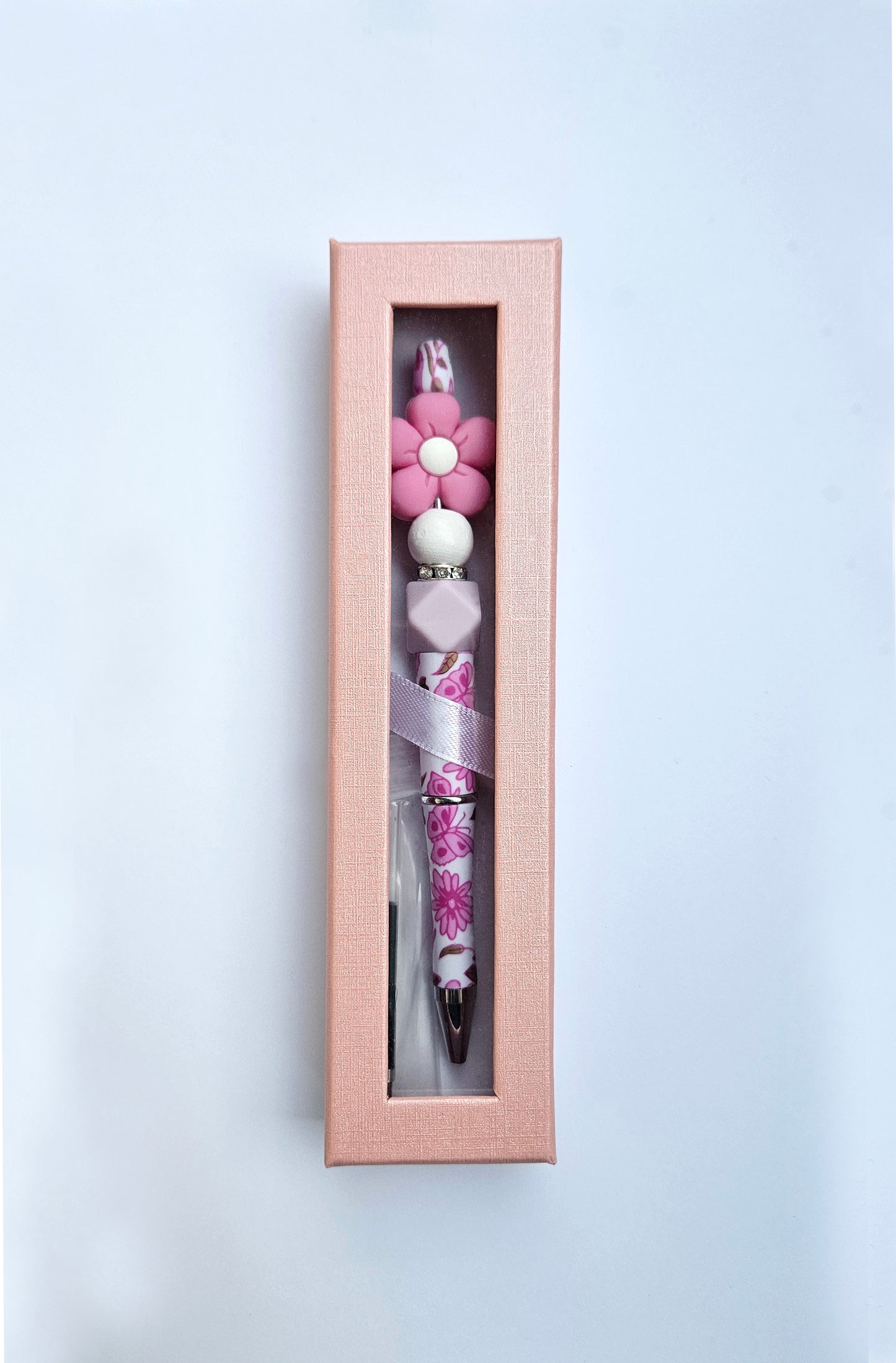 Beaded pen with flower