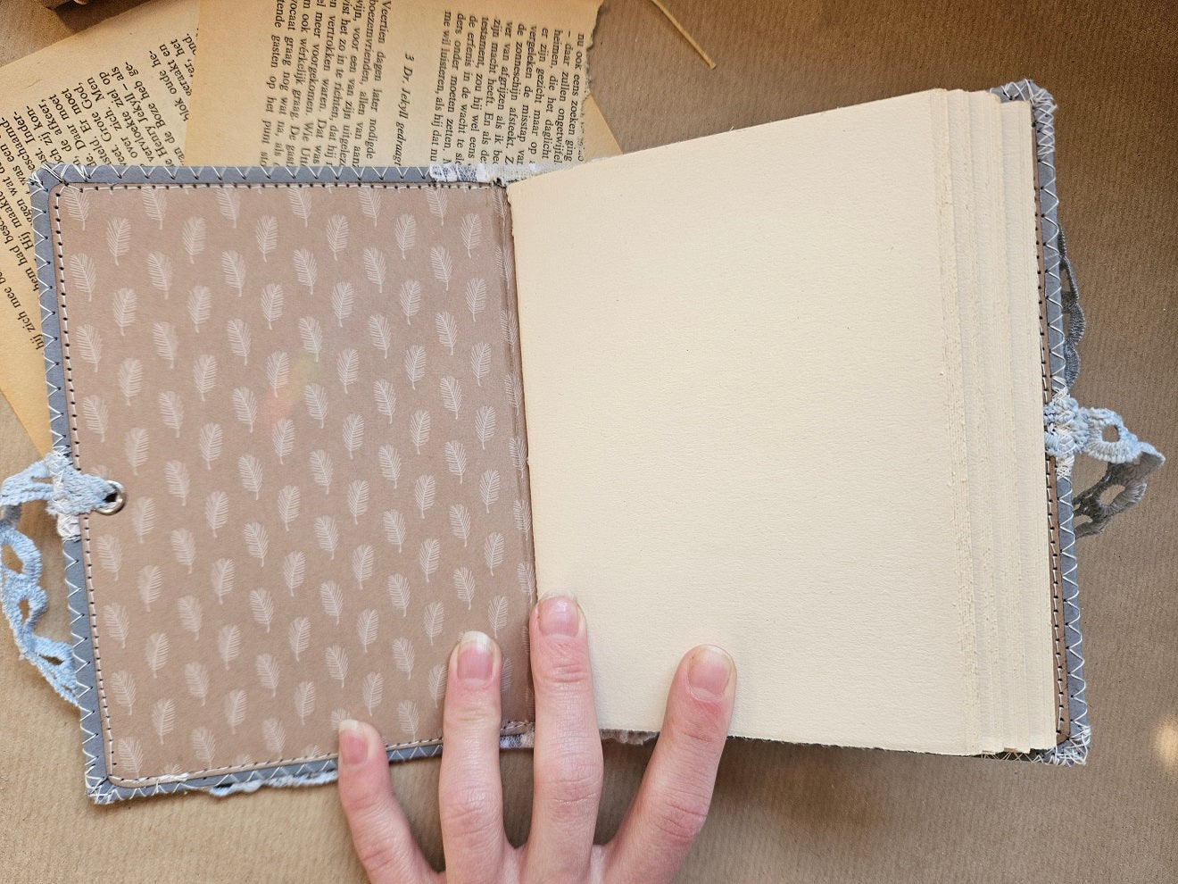 Handmade booklet with lace & a charm