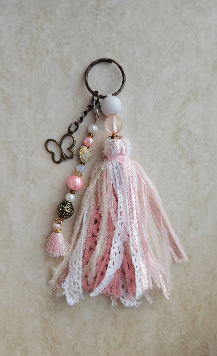 Charm with butterfly pendant and ribbons