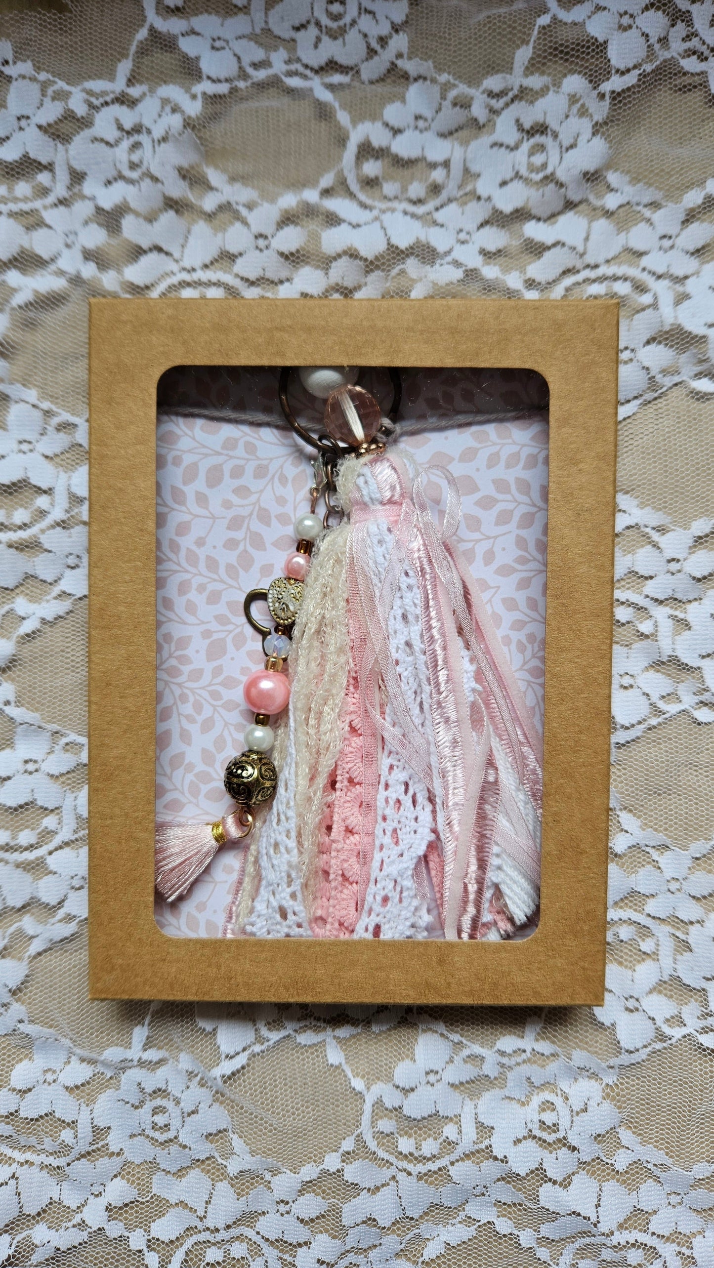 Charm with butterfly pendant and ribbons