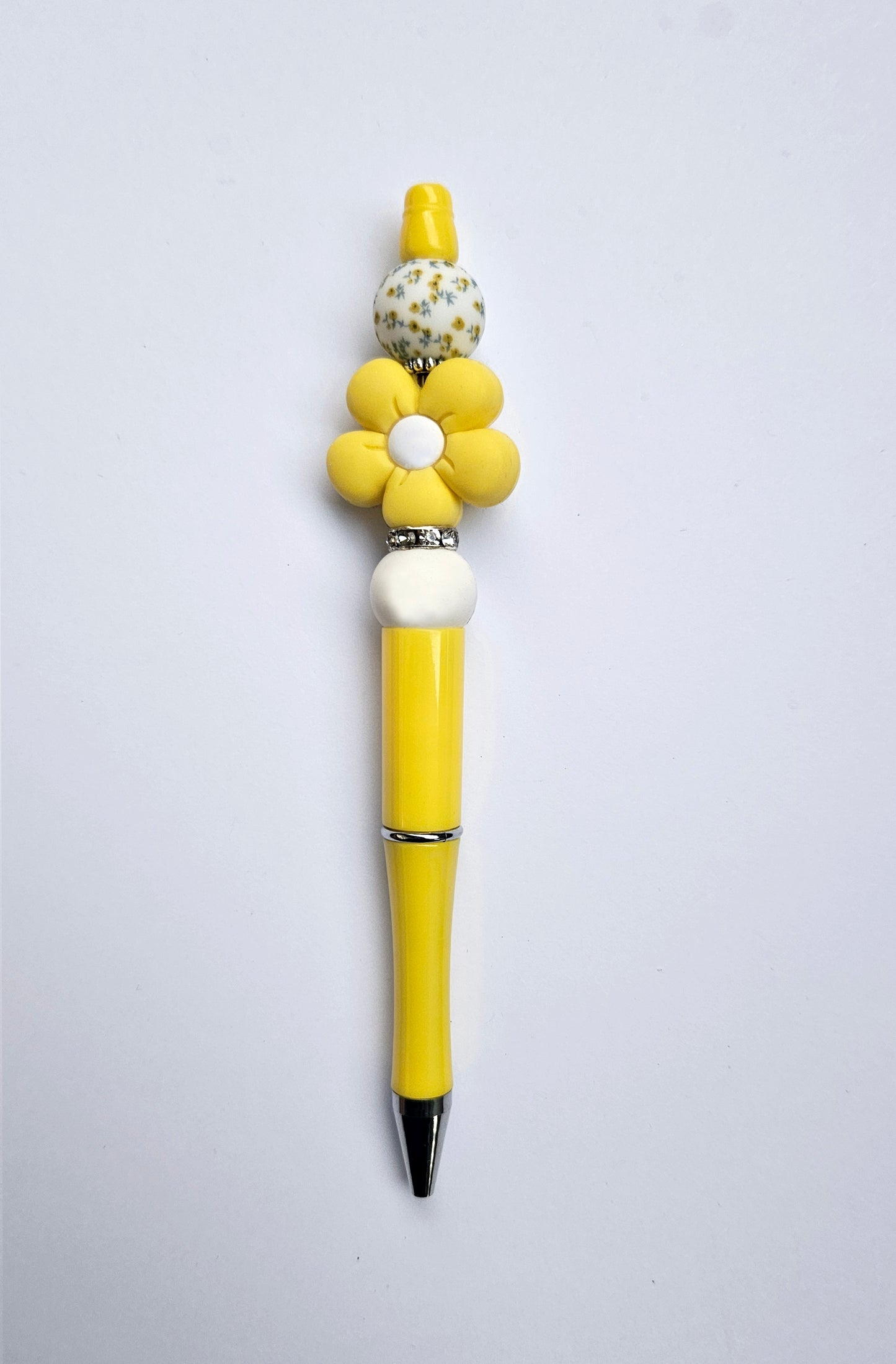 Beaded pen with flower