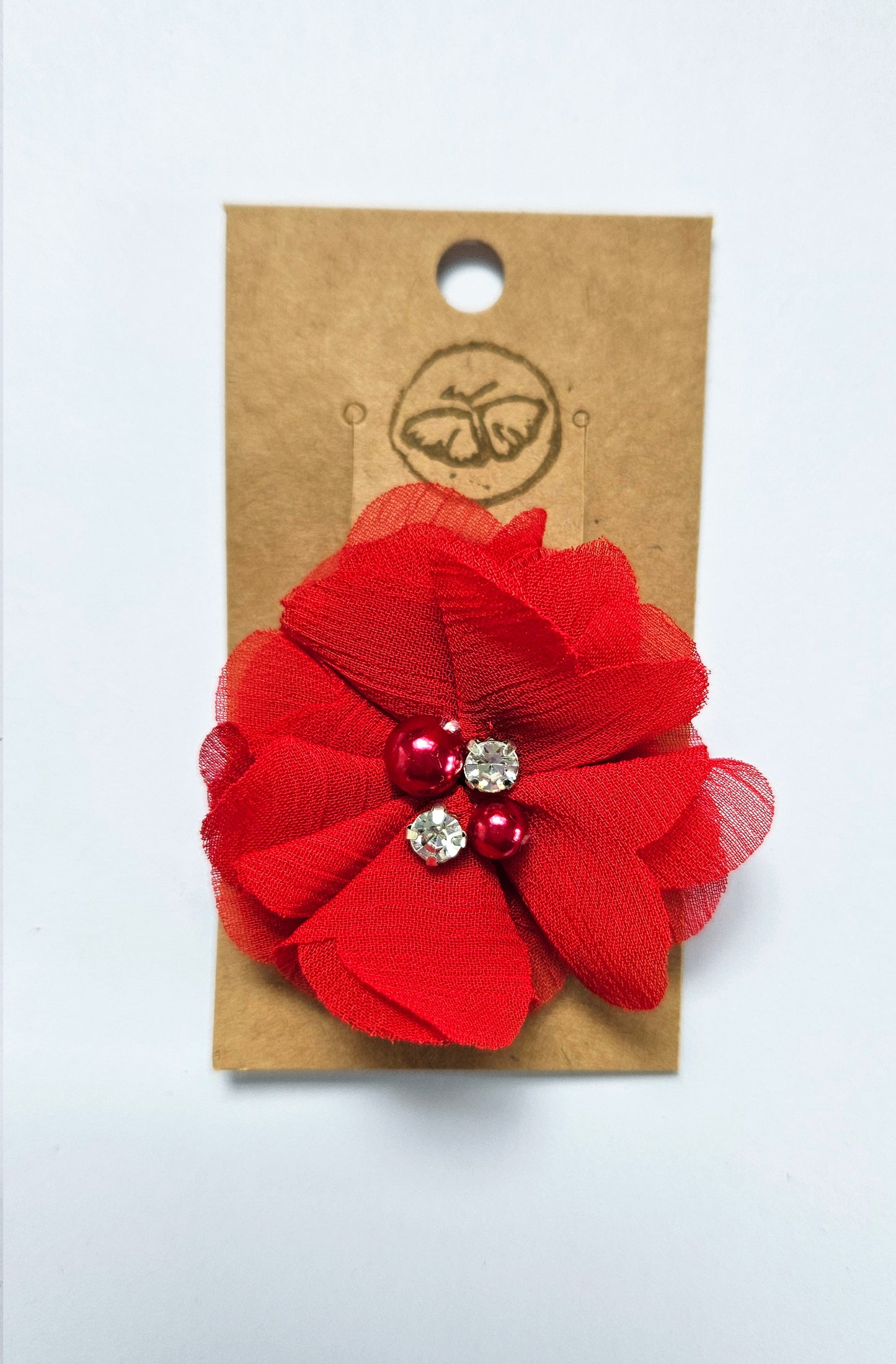 Hairclip with red flower and rhinestone pearls