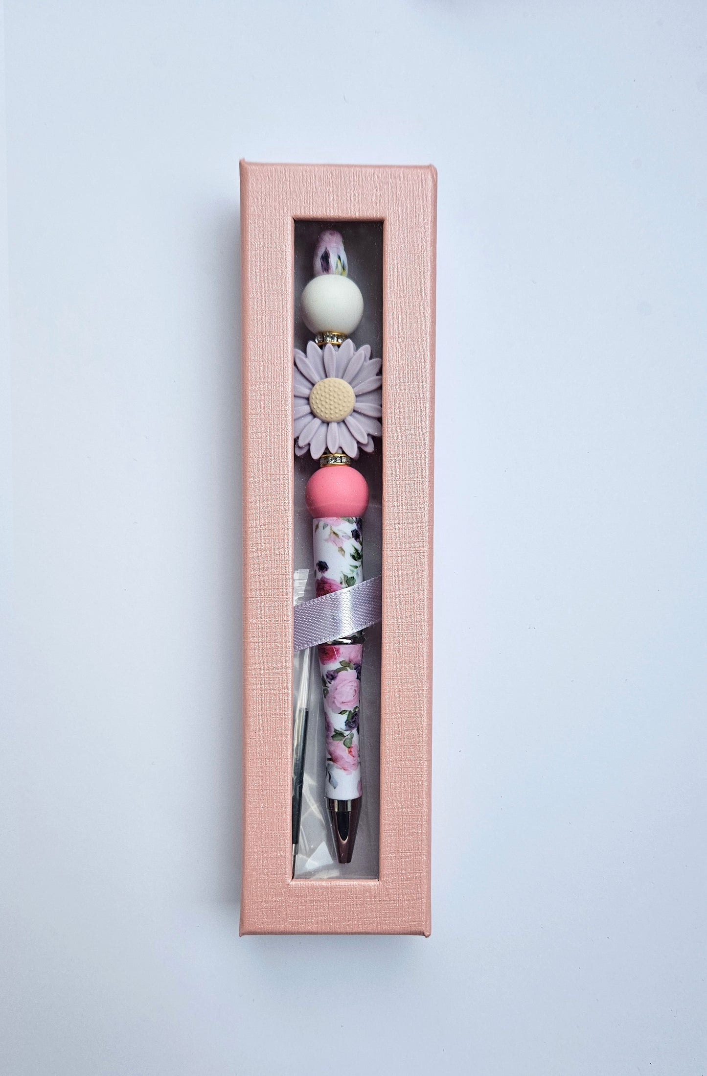 Beaded pen with purple daisy